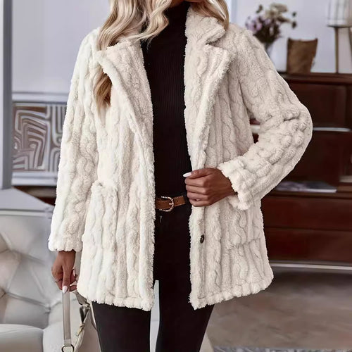 Women's coat in soft and warm faux fur with chic and stylish button design