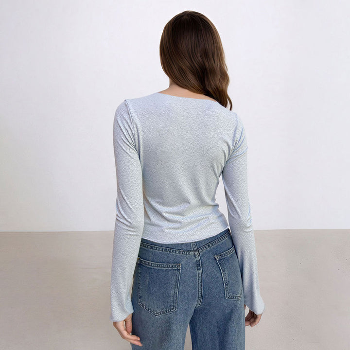 Chemise à manches longues cropped pour femmes avec fente latérale et design élégant Chic & Stil