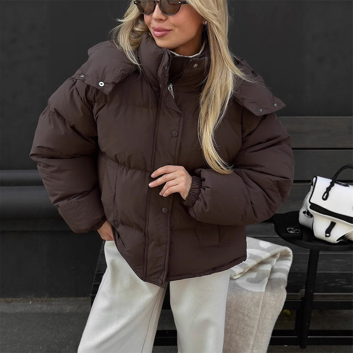 Women's short-cut oversized quilted jacket with high stand-up collar and concealed snap button placket Amarae