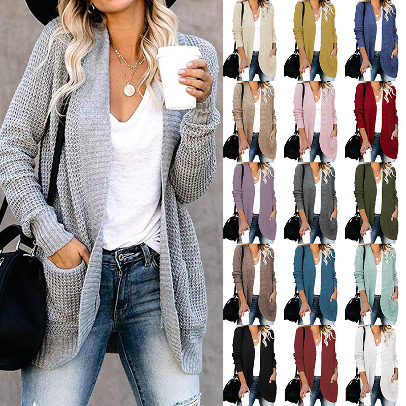 Casual knitted sleeveless cardigan for women with open sleeves and large pockets Lune London