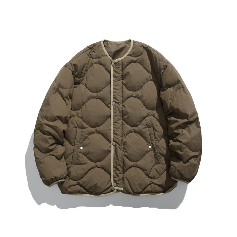 Unisex Kastig padded short jacket with circular quilting, round neckline and contrast piping Amarae