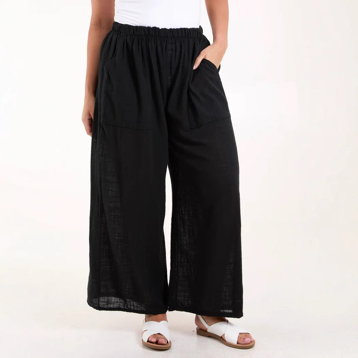 Light chiffon pants for women with elastic waist and practical pockets Lune London