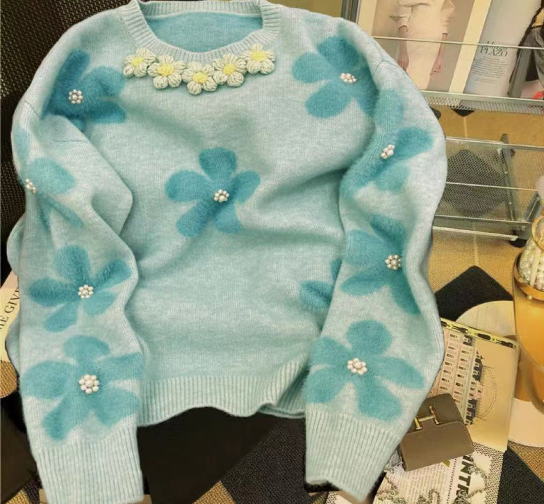 Pull en tricot pour femmes avec design floral et embellissements en perles Chic & Stil