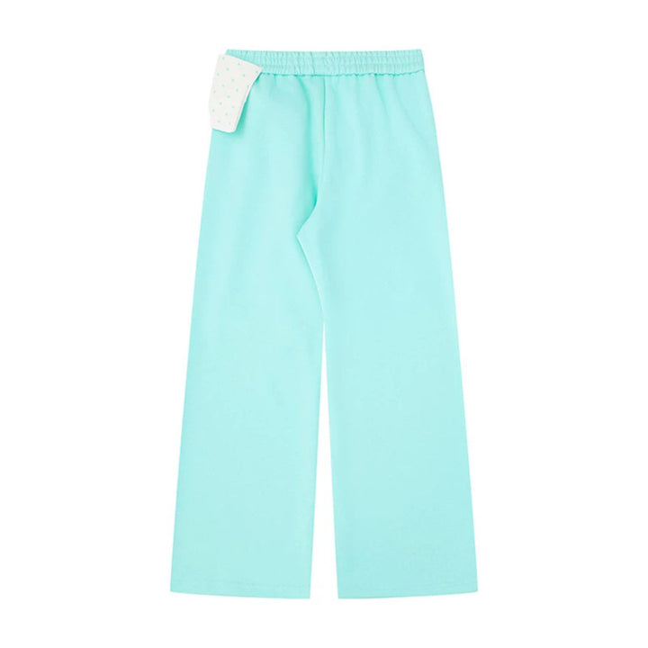 Women's culotte joggers with wide legs and decorative polka dot bow detail