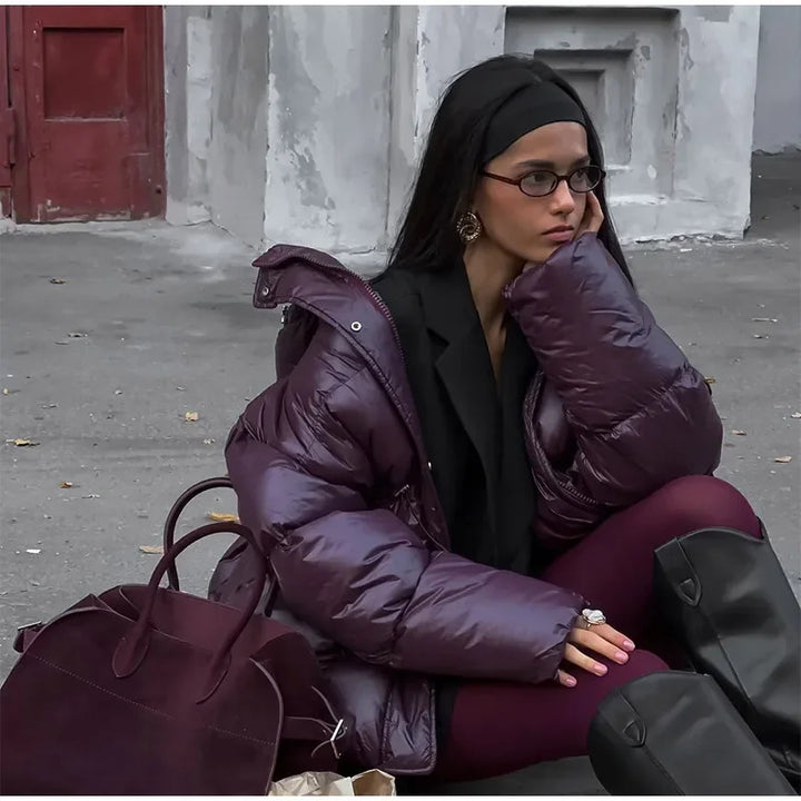 Oversized fashionable down jacket for women with a belted waist and side pockets Lune London