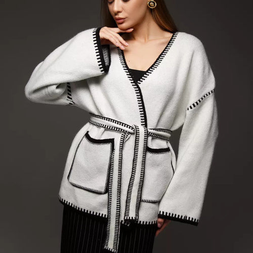 Comfortable knitted cardigan for women with a deep V-neck and practical pockets Amarae