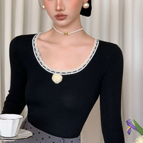 Women's long-sleeve shirt with romantic lace accents and floral details