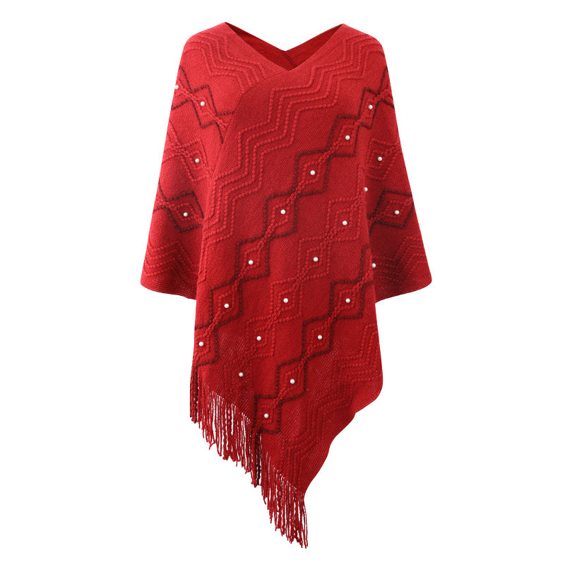 Lune London Elegant poncho for women with a striking textured pattern and decorative fringes