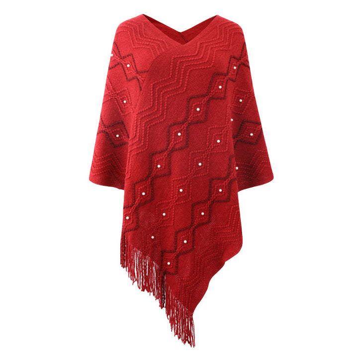Lune London Elegant poncho for women with a striking textured pattern and decorative fringes