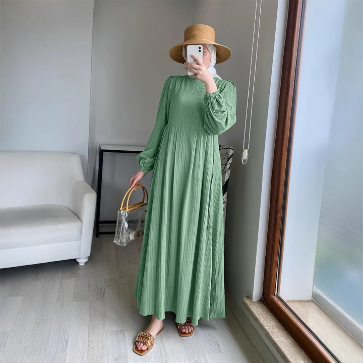 Maxi dress for women with elegant draping and elastic sleeves Lune London