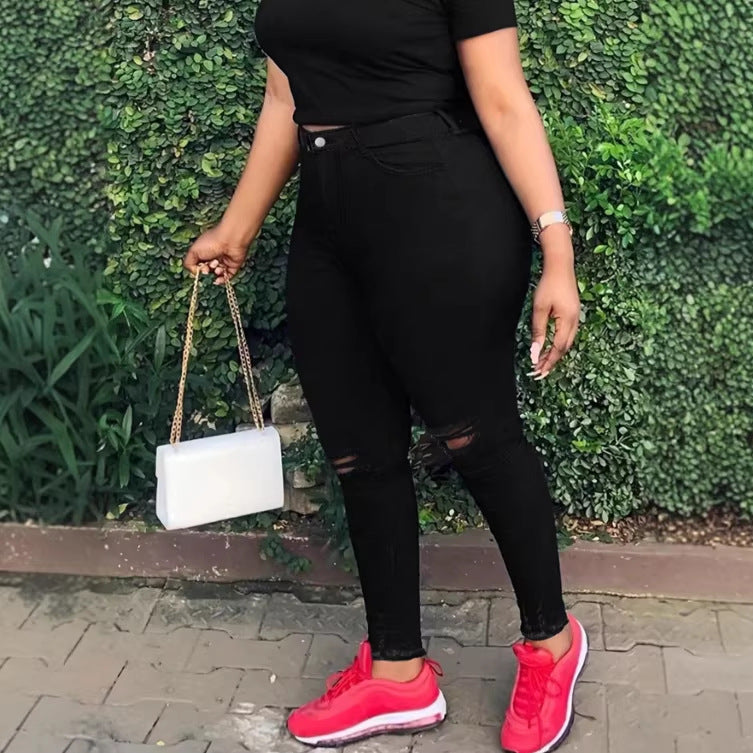 Women high-waisted body-shaping skinny jeans with knee rips and butt-lifting waistband Amarae