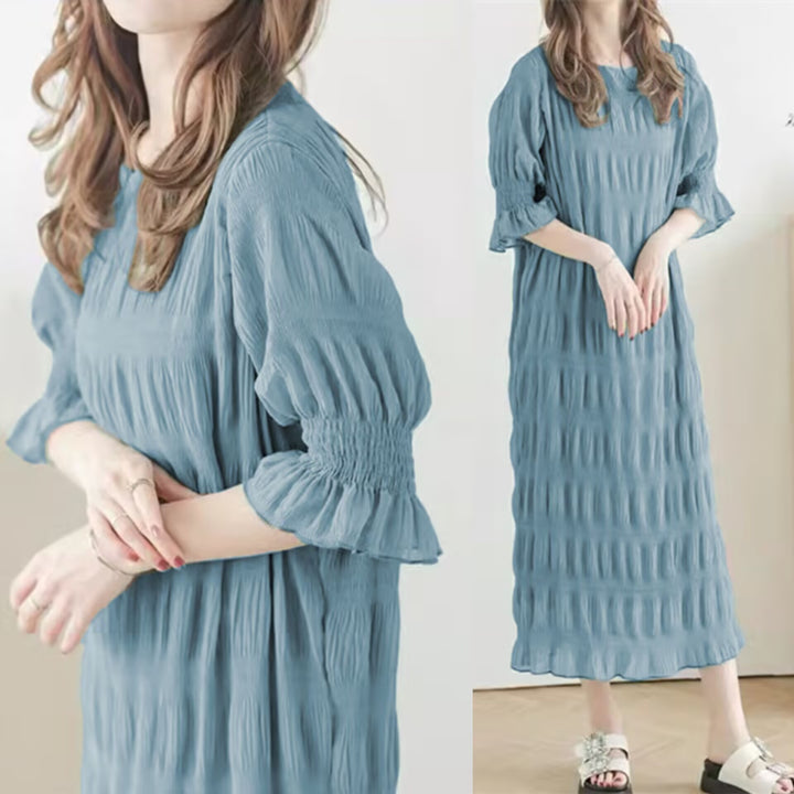 Casual maxi dress for women with elastic puff sleeves and a refined textured design Lune London