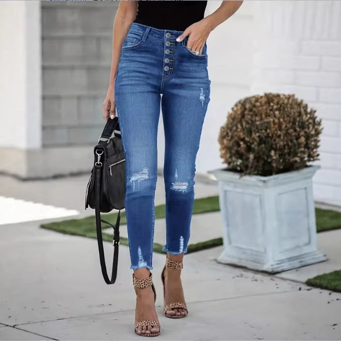Women's High-Waisted Skinny Jeans with Visible Button Placket, Destroyed Knee Areas, and Raw Ankle Hem Amarae