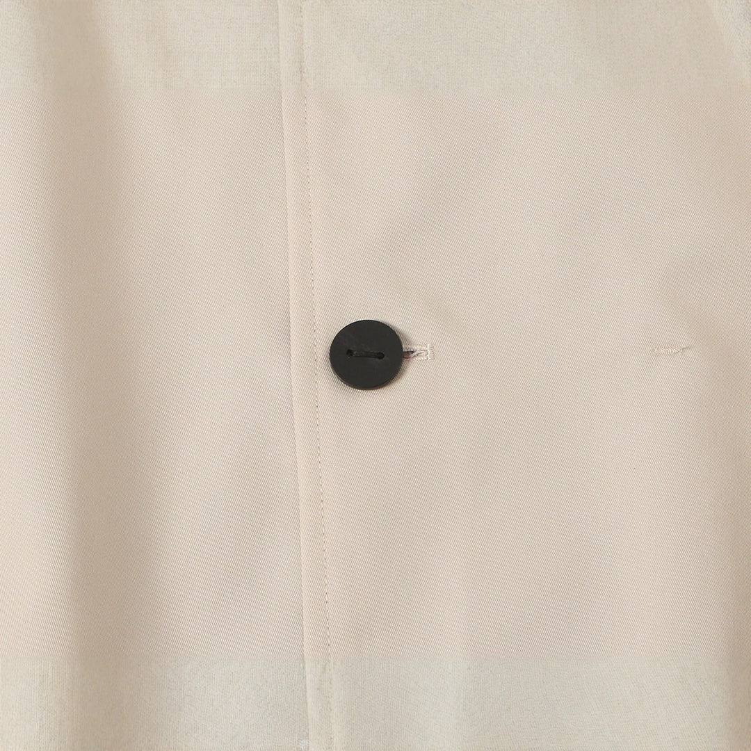 Women's short jacket with high stand-up collar and asymmetrical button placket Amarae