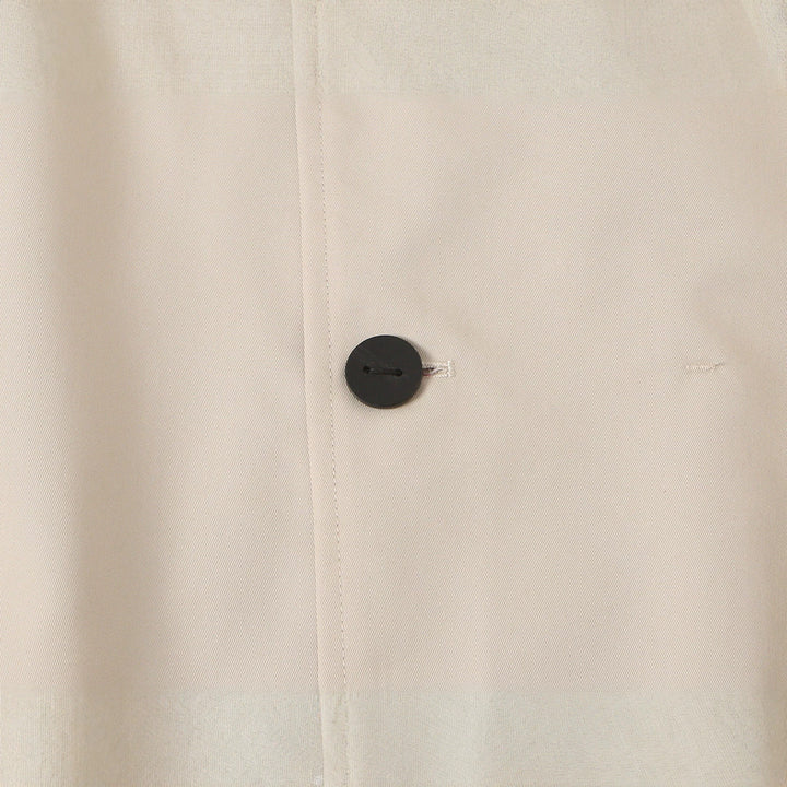 Women's short jacket with high stand-up collar and asymmetrical button placket Amarae