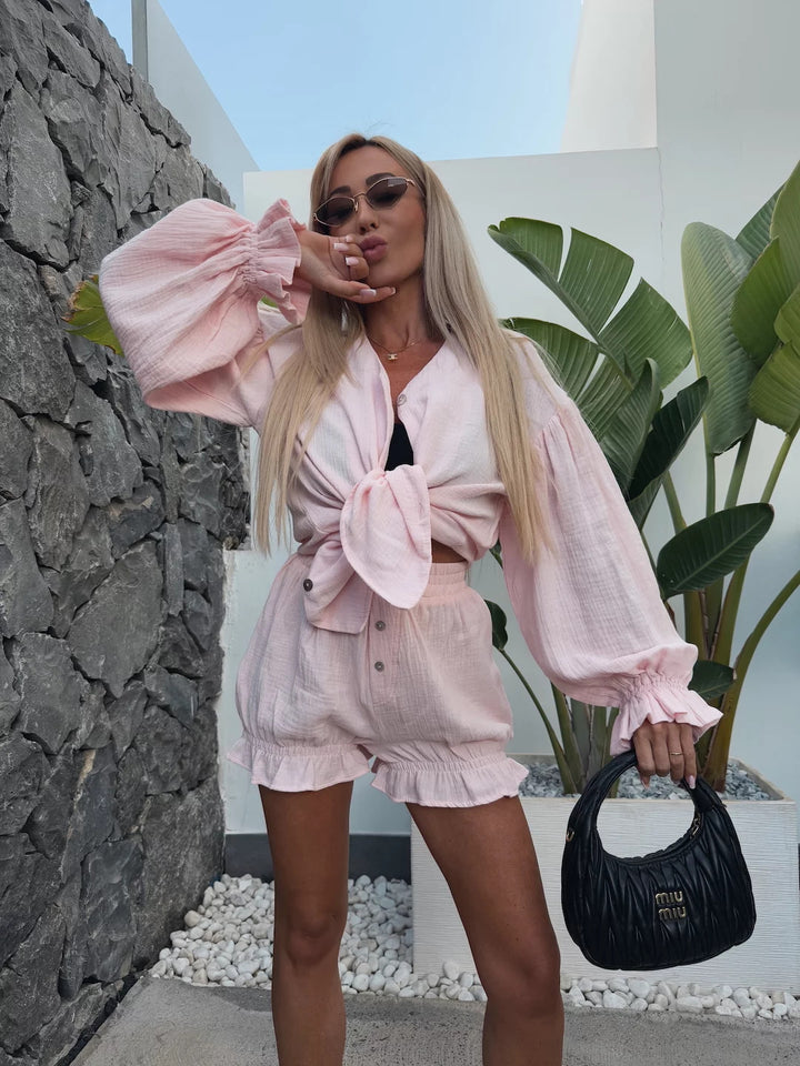 Fashionable women's loungewear set with bow-shaped top and ruffled shorts Lune London