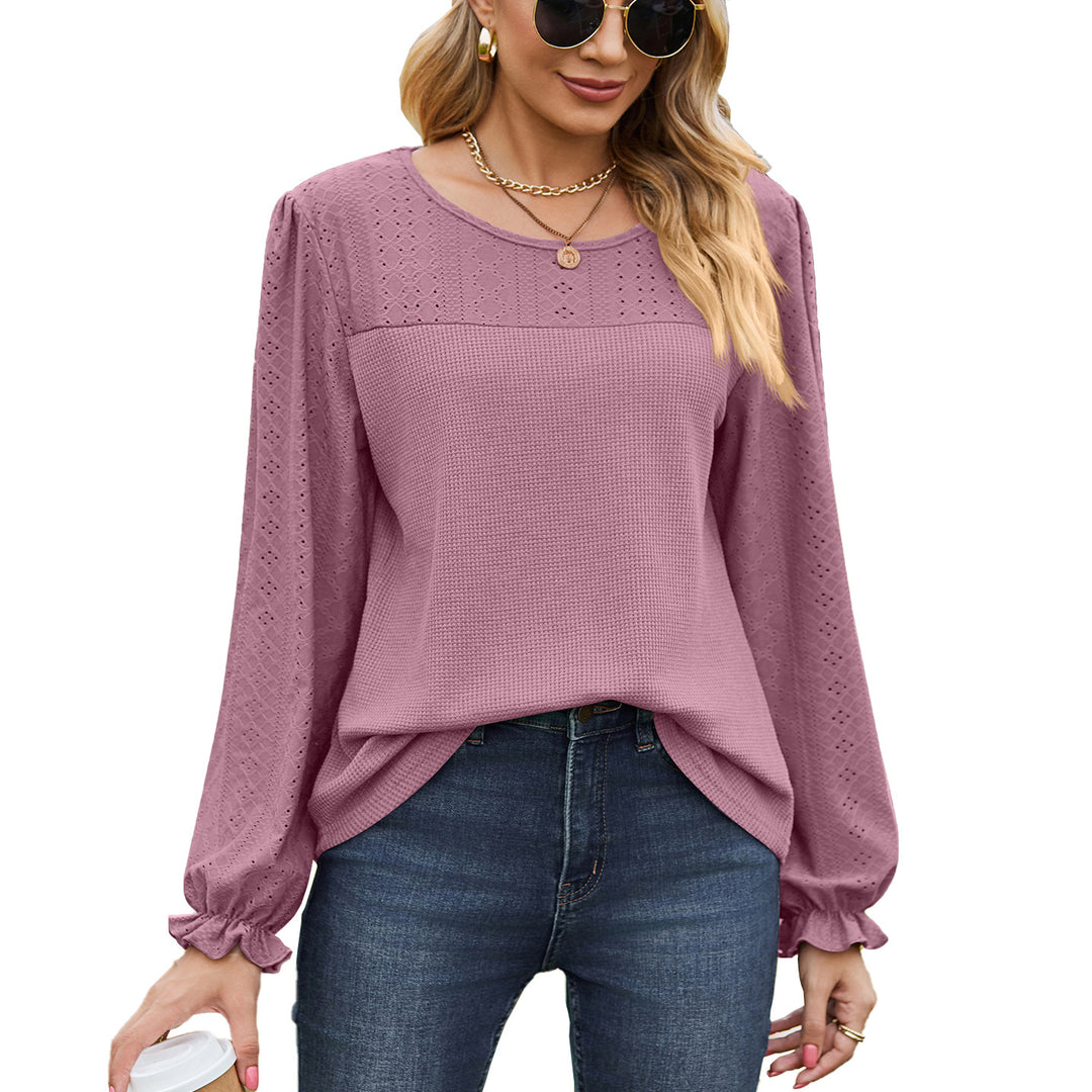 Women's top with textured design and elegant puff sleeves Amarae
