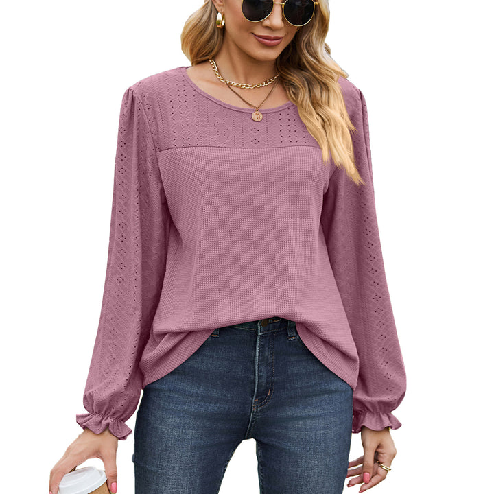 Women's top with textured design and elegant puff sleeves Amarae