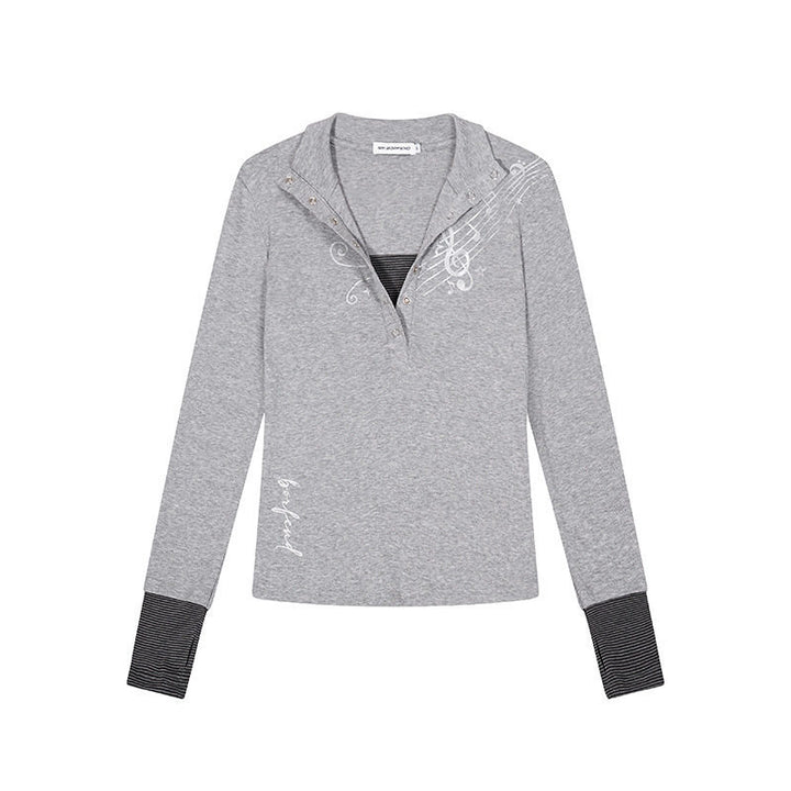 Women’s long-sleeve shirt with Henley button placket, contrast cuffs, and music note print Amarae