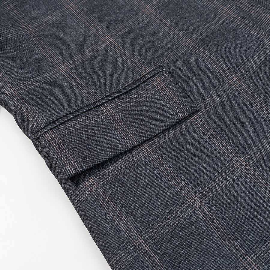 Veste à carreaux élégante pour femme avec coupe asymétrique Chic & Stil