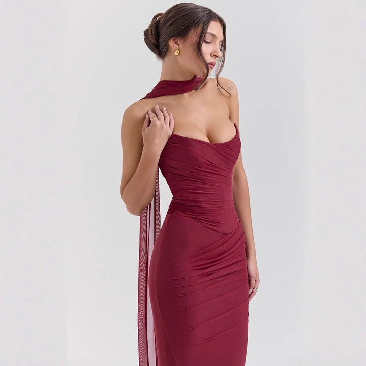 Women's form-fitting evening dress with off-shoulder design and sophisticated draping Lune London