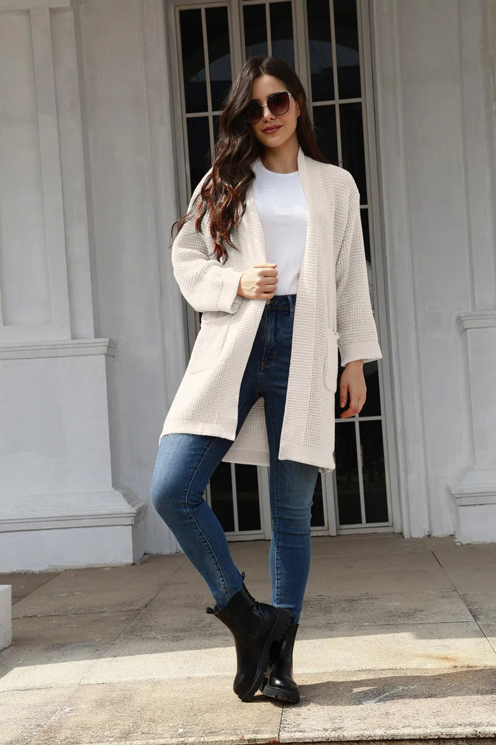 Cardigan en tricot confortable pour femmes avec poches ouvertes et coupe large Chic & Stil