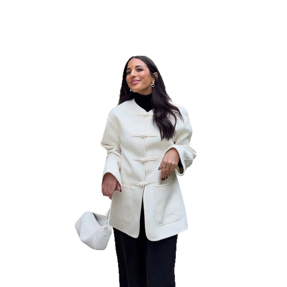 Women's short coat with Chinese toggle closures, oversized sleeves, and patch pockets Amarae