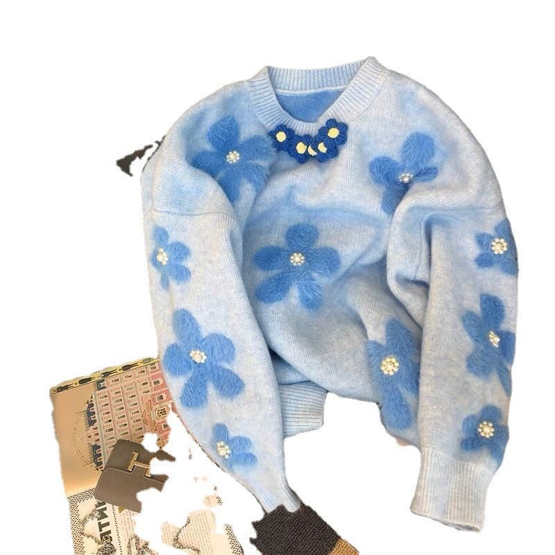 Pull en tricot pour femmes avec design floral et embellissements en perles Chic & Stil