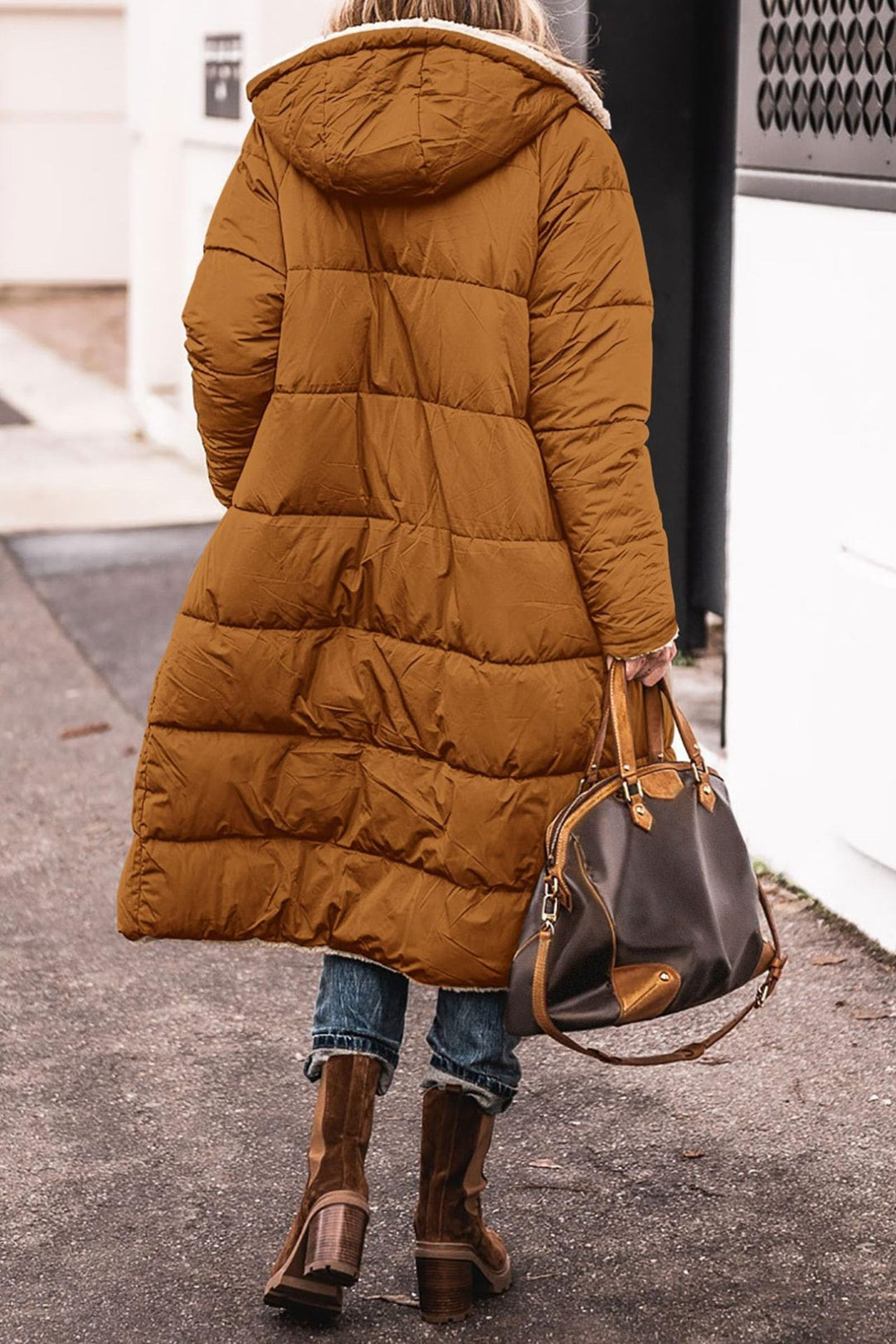 Winter coat for women in a casual oversized style with hood and side pockets Lune London