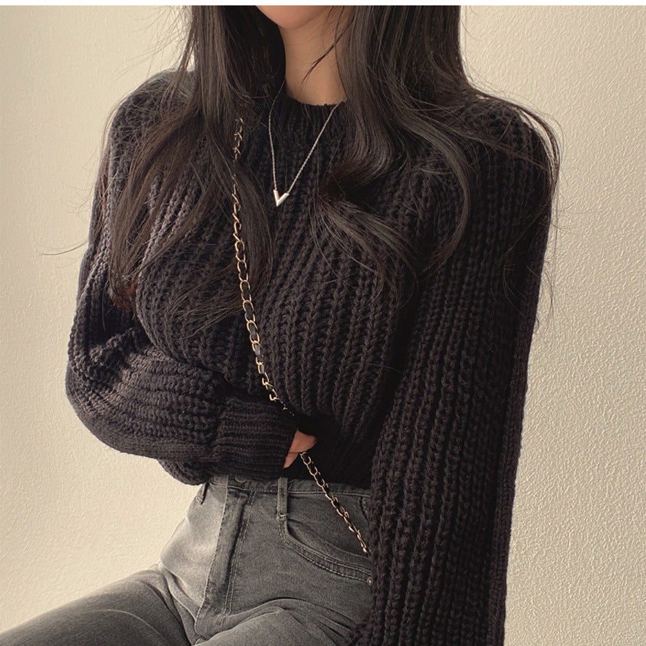 Thick knit women's sweater with oversized sleeves and a textured structure Lune London