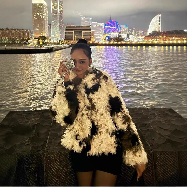 Women's Short Shaggy Faux Fur Bomber Jacket with Textured Patchwork Look Amarae