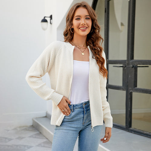 Women's knitted jacket with a modern textured pattern and practical zippered pockets Amarae