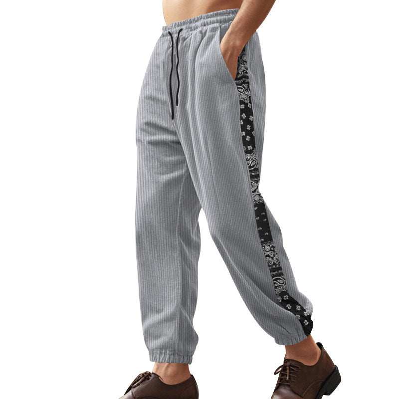 Men's leisure trousers with decorative side panels in bandana design Lune London