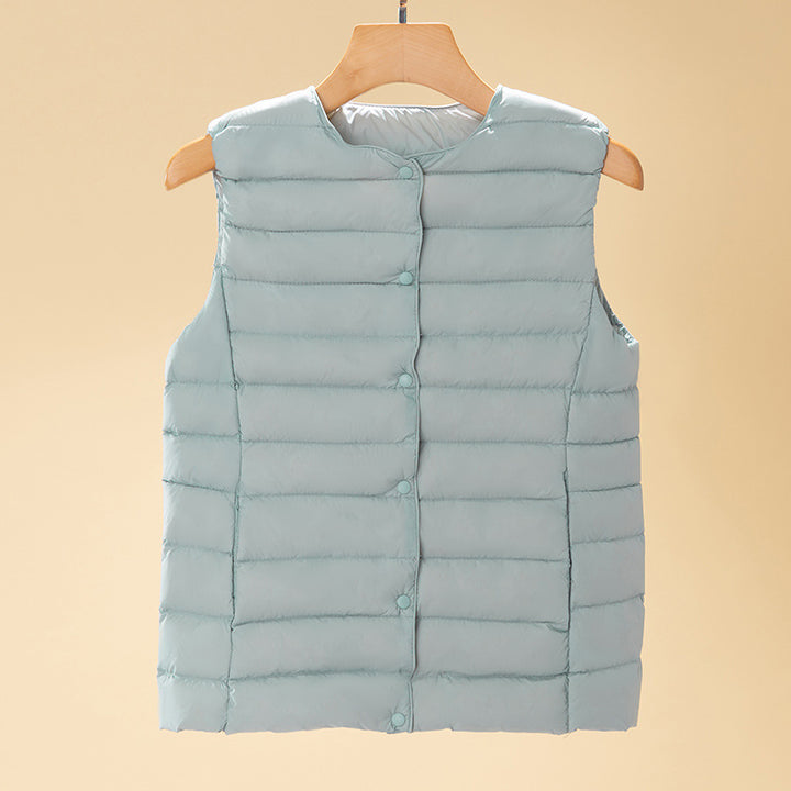 Women's sleeveless quilted thermal vest with round neck and snap button placket Amarae