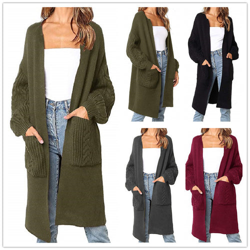 Knitted coat for women with deep V-neck and chunky knit details Amarae