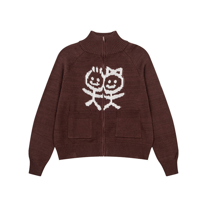 Women's chunky knit zip cardigan with stand-up collar, patch pockets and cartoon intarsia Amarae