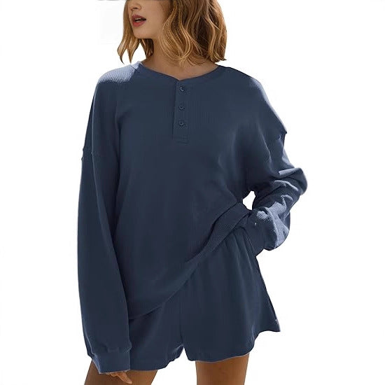 Dames loisirs t-shirt à manches longues pull avec détails de boutons Chic & Stil