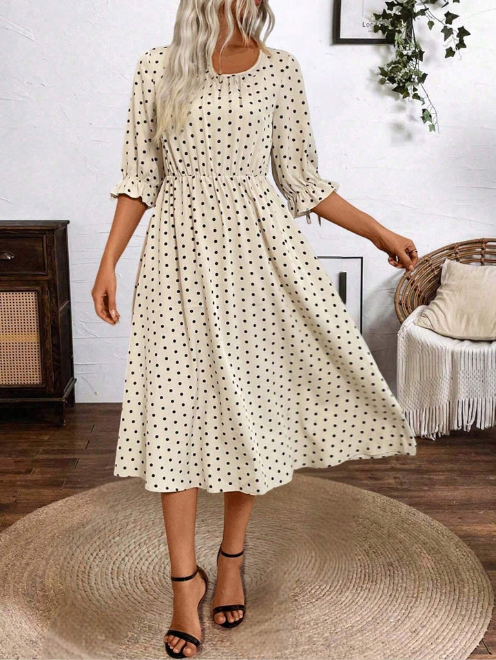 Lune London puff sleeve midi dress with an elastic waist