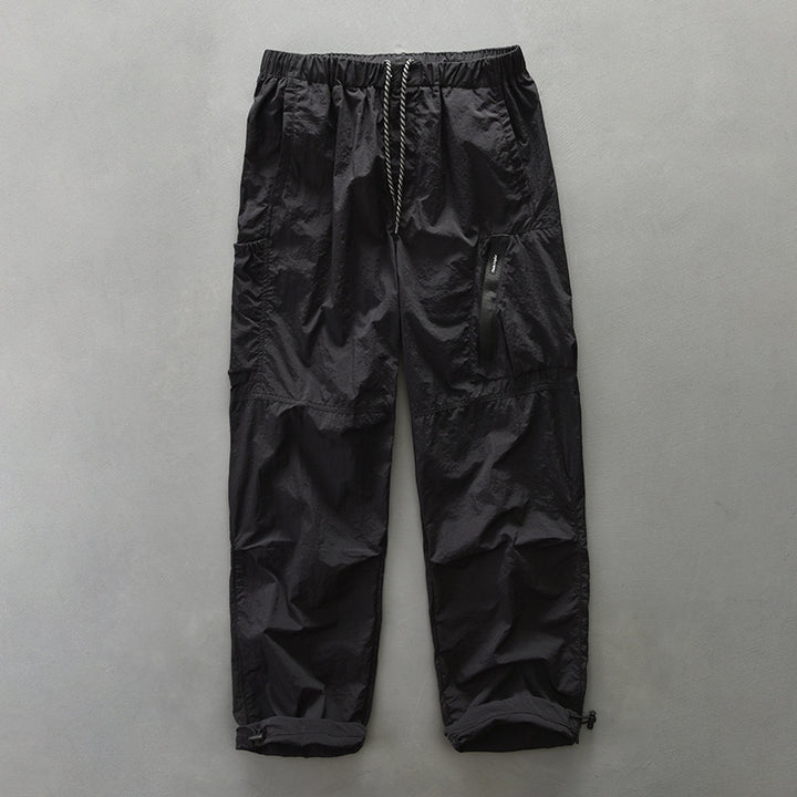 Functional pants for men with elastic waistband and zippered side pockets Lune London