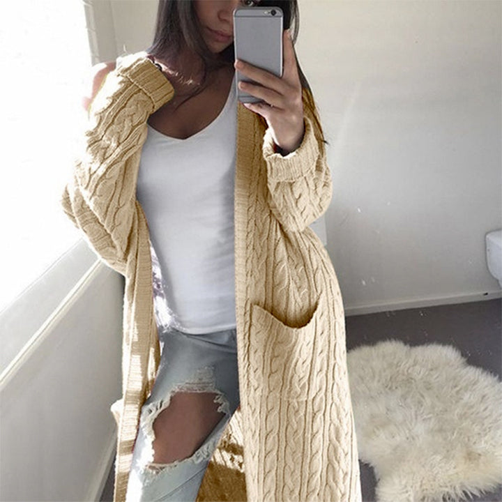 Knitted coat for women with cable pattern and practical pockets Lune London