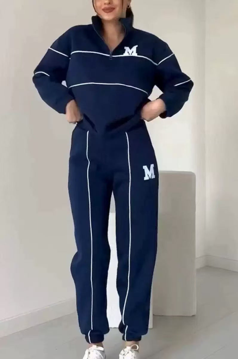 Sporty lounge suit for women with high collar and elastic waist Lune London