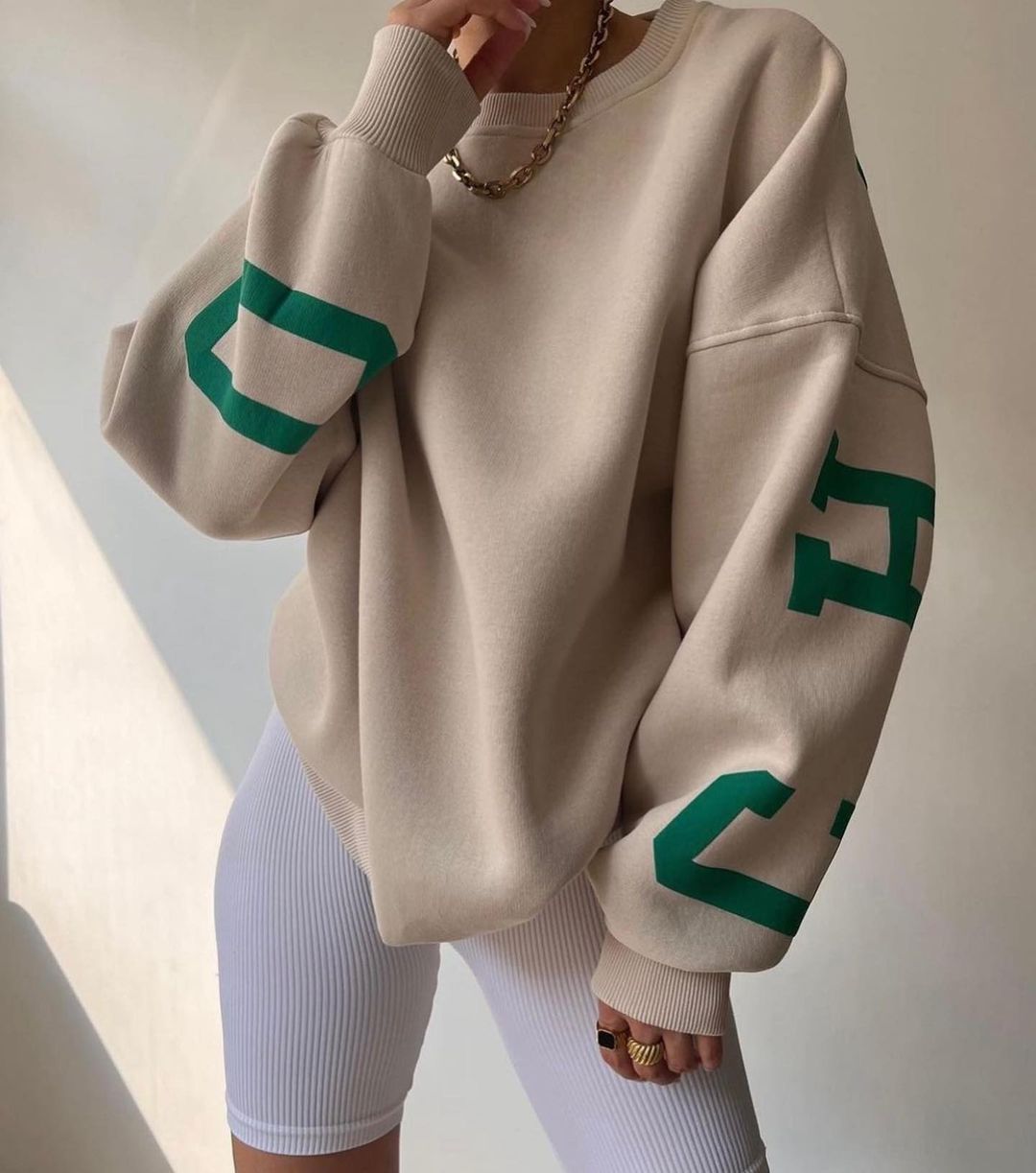 Ladies Oversized Sweatshirt with Chic Logo and Striking Style