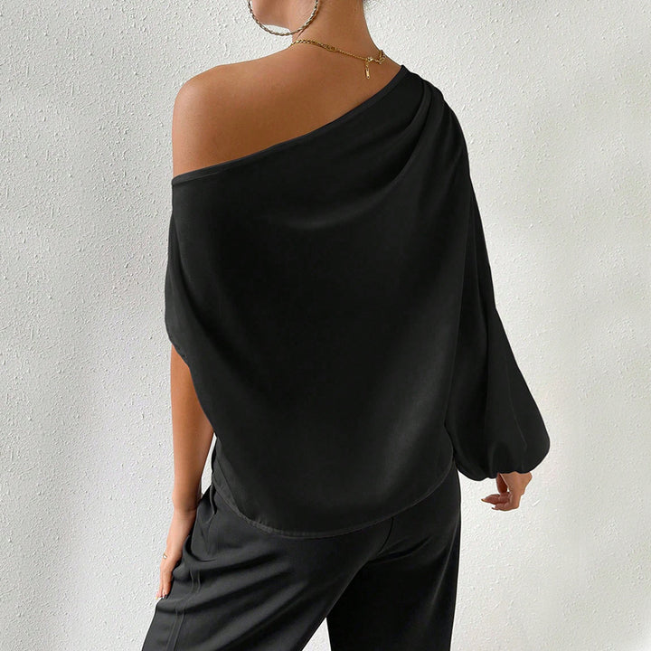 Haut asymétrique pour femmes avec des manches bouffantes élégantes Chic & Stil