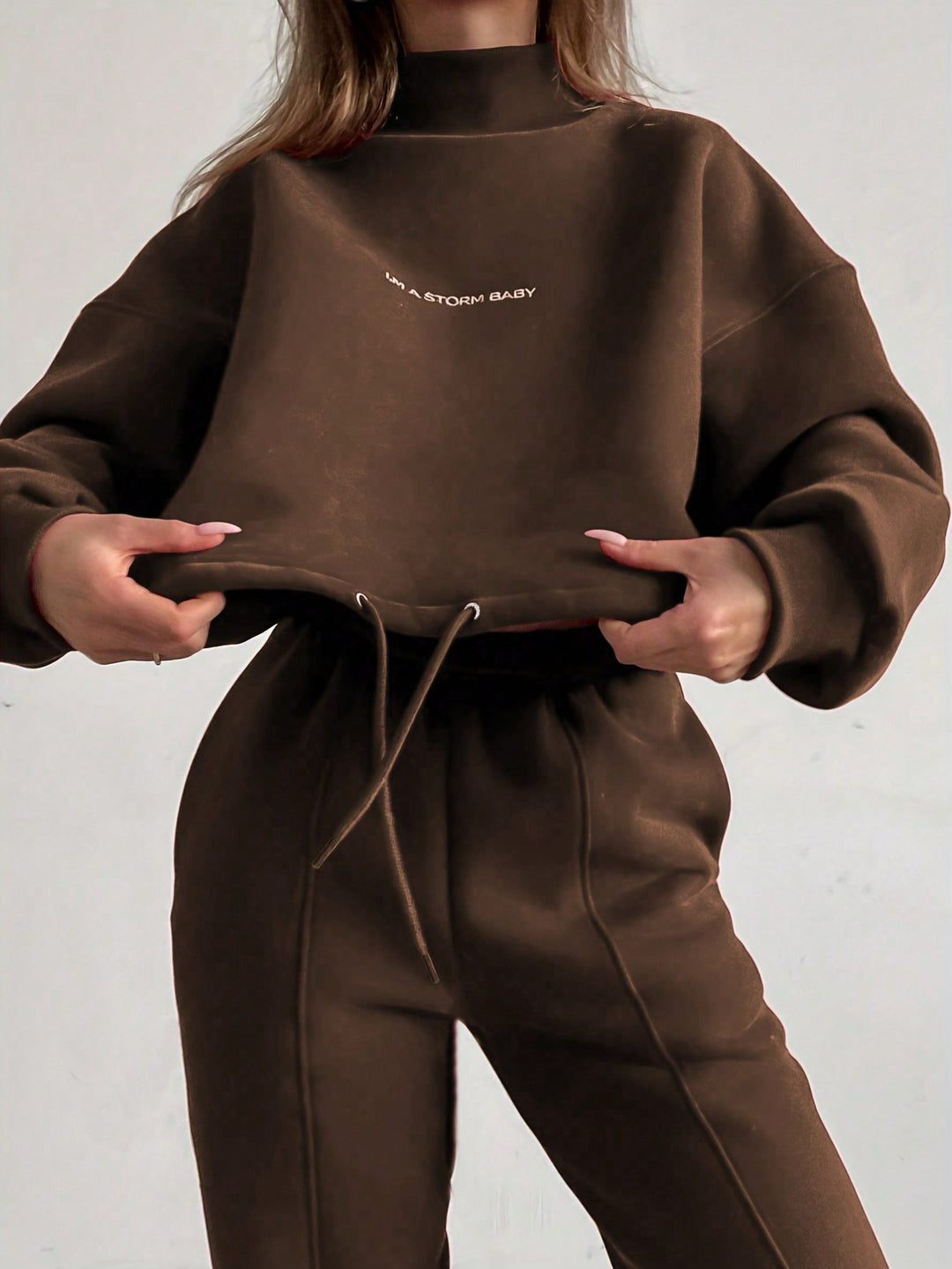 Ladies oversized comfortable sweat outfit with high collar and relaxed cuffs Lune London