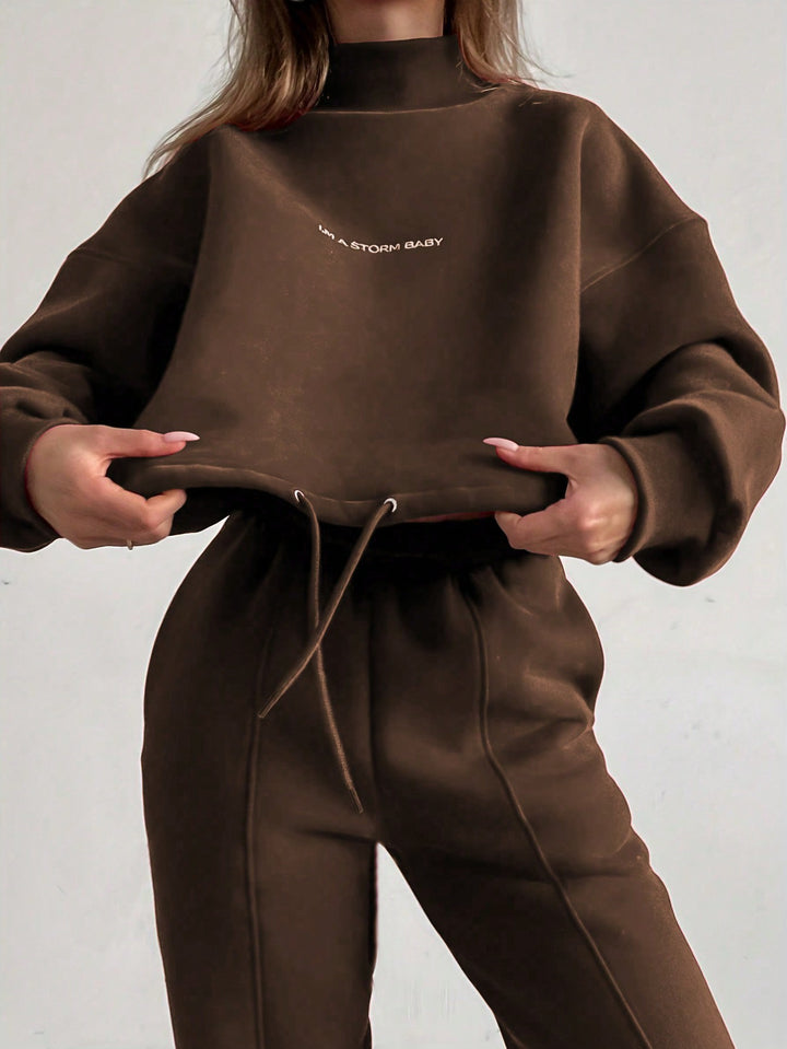 Ladies oversized comfortable sweat outfit with high collar and relaxed cuffs Lune London