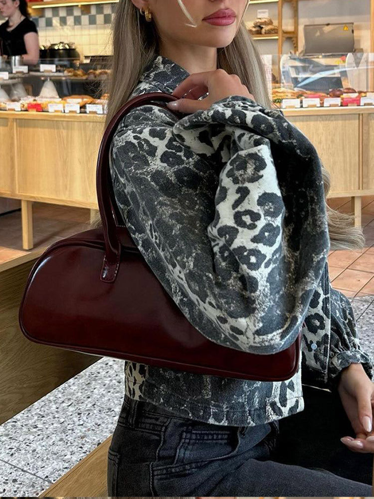 Elegant retro design handbag for ladies with an ergonomic carry handle Lune London