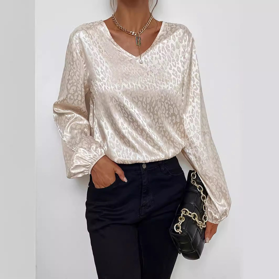 Blouse élégante pour femmes avec col en V et manches volumineuses Chic & Stil