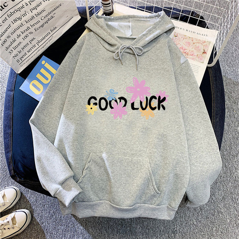 Women's hoodie with cheerful design and printed lettering Chic & Stil