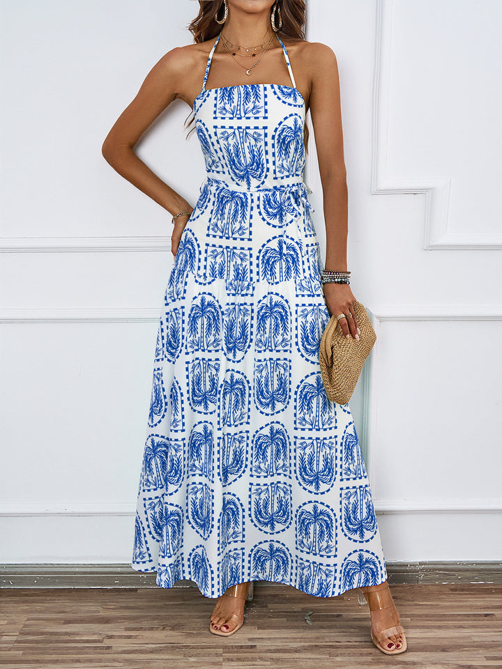 Women's maxi dress with fine graphic print and adjustable halter neck Chic & Stil