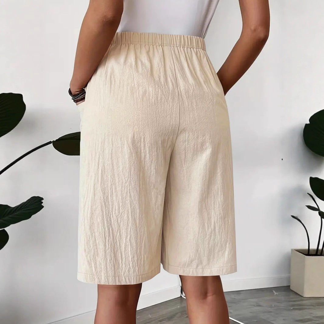 Mid-length wrap skirt for women with elastic waist and practical pockets Lune London